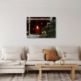 Obraz na szkle - Świecąca świeca bożonarodzeniowa (70x50 cm)