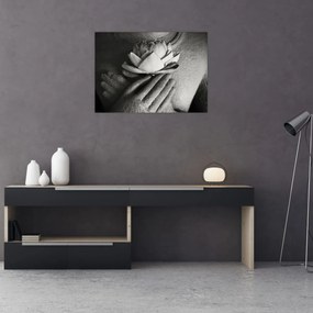Obraz na szkle - Lotos w rękach Buddy (70x50 cm)