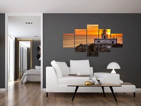 Obraz latarni morskiej o zachodzie słońca (125x70 cm)