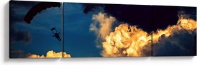 Obraz skoczka spadochronowego w chmurach (170x50 cm)