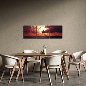 Obraz słońca za chmurami (z zegarem) (90x30 cm)