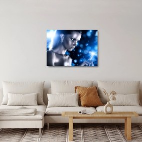 Obraz na szkle kobiety w niebieskim blasku (70x50 cm)