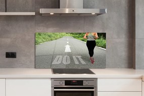 Szkło do Kuchni na Ścianę Kobieta Biegnąca Drogą