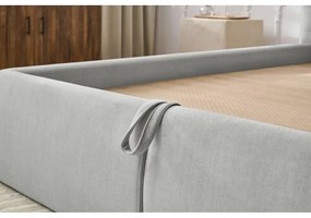 Jasnoszare tapicerowane łóżko dwuosobowe ze schowkiem i stelażem 180x200 cm Clothilde – Bobochic Paris