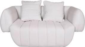 Welurowa sofa z dekoracyjnymi poduszkami Nua N90