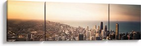 Obraz zachodu słońca nad miastem (170x50 cm)