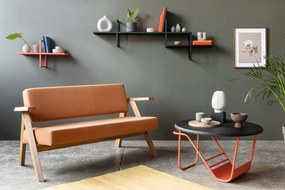 Designerski stolik kawowy z pomarańczową podstawą Wave