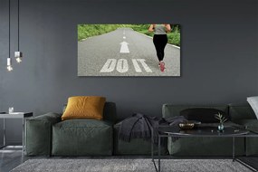 Obraz canvas na ścianę Kobieta Biegnąca Drogą