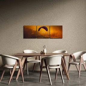 Obraz spadochroniarza o zachodzie słońca (z zegarem) (90x30 cm)