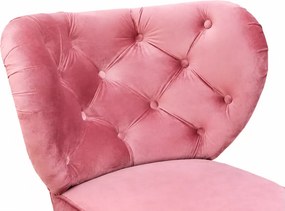 Tapicerowany fotel Gibo na wysokich drewnianych nóżkach