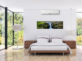 Obraz wodospadu między skałami (170x50 cm)