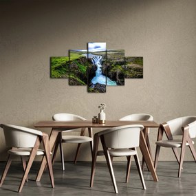 Obraz wodospadu między skałami (125x70 cm)