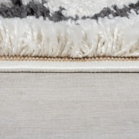 Dywan w kolorze kości słoniowej 80x150 cm Souq Lines – Flair Rugs