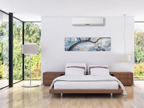 Obraz ośnieżonego drzewa nad wodą (170x50 cm)