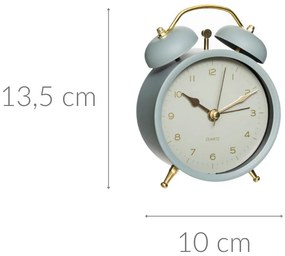 Zegarek budzik ze złotymi wskazówkami