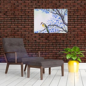 Obraz - ptak na drzewie z niebieskimi kwiatami (70x50 cm)