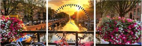 Obraz - Wschód słońca w Amsterdamie (z zegarem) (90x30 cm)