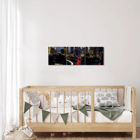 Obraz - Miasto nocą (z zegarem) (90x30 cm)