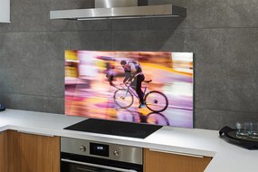 Szklany Panel Człowiek i Rower w Blasku Świateł