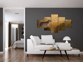 Obraz wilka na skale (125x70 cm)