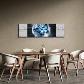 Obraz niebieskiego motyla na ścianie (170x50 cm)