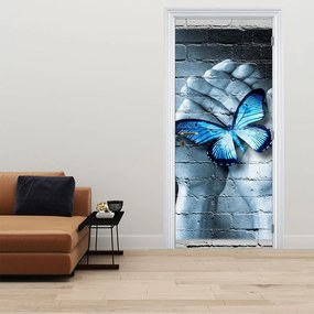 Fototapeta na drzwi - Niebieski motyl na ścianie (95x205cm)
