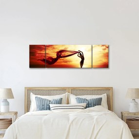 Obraz - Sylwetka kobiety o zachodzie słońca (170x50 cm)
