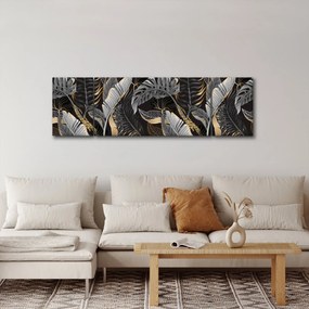 Obraz - Tropikalne liście w kolorze czarno - złotym (170x50 cm)