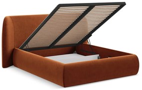 Tapicerowane łóżko dwuosobowe w kolorze terakoty ze schowkiem i stelażem 160x200 cm Hauke – Makamii