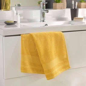Żółty bawełniany ręcznik frotte 50x90 cm Tendresse – douceur d'intérieur