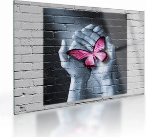 Obraz na szkle - Różowy motyl w ścianie (70x50 cm)