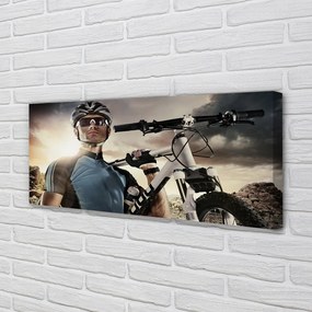 Obraz drukowany na płótnie Rowerzysta na Tle Chmur