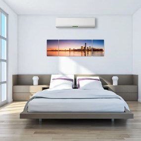 Obraz miasta o zachodzie słońca (170x50 cm)