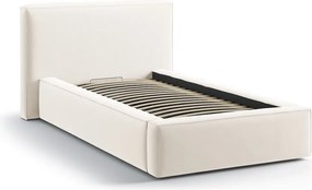 Kremowe tapicerowane łóżko jednoosobowe ze schowkiem i stelażem 90x200 cm Jodie – Micadoni