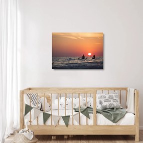 Obraz na szkle kajakarzy o zachodzie słońca (70x50 cm)