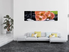 Obraz - Pomarańczowa orchidea z liśćmi palmy (170x50 cm)