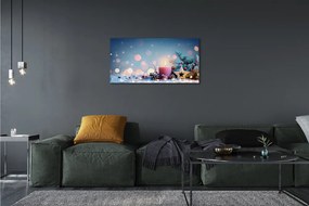 Obraz drukowany na płótnie Świeca i Śnieg w Świątecznej Scenerii