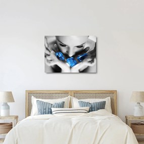 Obraz na szkle portretu kobiety z kamieniami (70x50 cm)