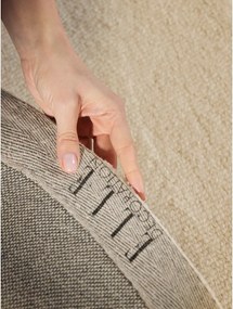 Beżowy wełniany okrągły dywan tkany ręcznie ø 160 cm Puristic Knots – Elle Decoration