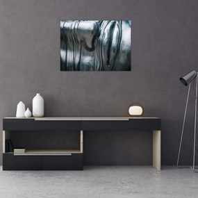 Obraz na szkle - Twarz ze stali (70x50 cm)