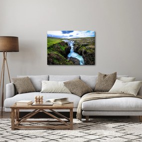 Obraz wodospadu między skałami (70x50 cm)