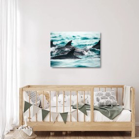 Obraz na szkle - Delfiny w oceanie (70x50 cm)
