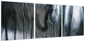 Obraz - Twarz ze stali (z zegarem) (90x30 cm)