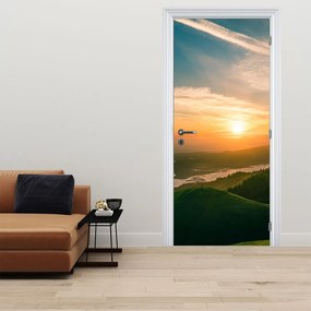 Fototapeta na drzwi - Wschód Słońca nad morzem (95x205cm)