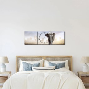 Obraz - Słonie w wielkim mieście (z zegarem) (90x30 cm)