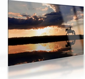 Obraz na szkle - Jeździec na koniu o zachodzie słońca (70x50 cm)