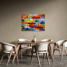 Obraz na szkle kolorowych parasoli (70x50 cm)
