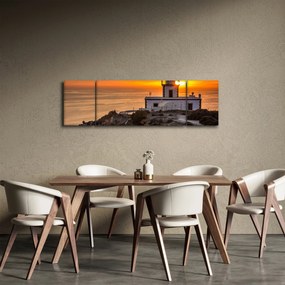 Obraz latarni morskiej o zachodzie słońca (170x50 cm)