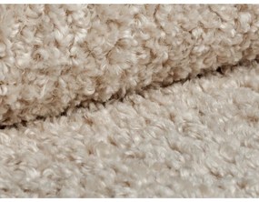 Jasnobrązowy puf z materiału bouclé Dia – Micadoni