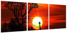 Obraz - Sylwetki zwierząt o zachodzie słońca (z zegarem) (90x30 cm)